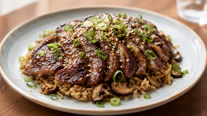 Soy ginger beef blade roast sliced over mushroom rice